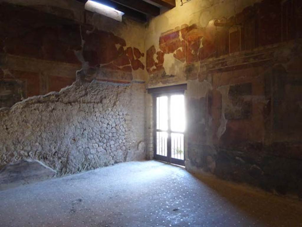 III.11 Herculaneum, June 2017, Room 8, looking towards north-west corner and doorway to portico.  Photo courtesy of Michael Binns.
