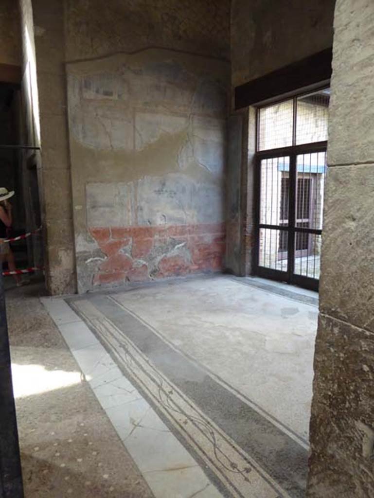 III.11 Herculaneum, October 2014. Room 9, looking across tablinum to the south wall.
Photo courtesy of Michael Binns. 
