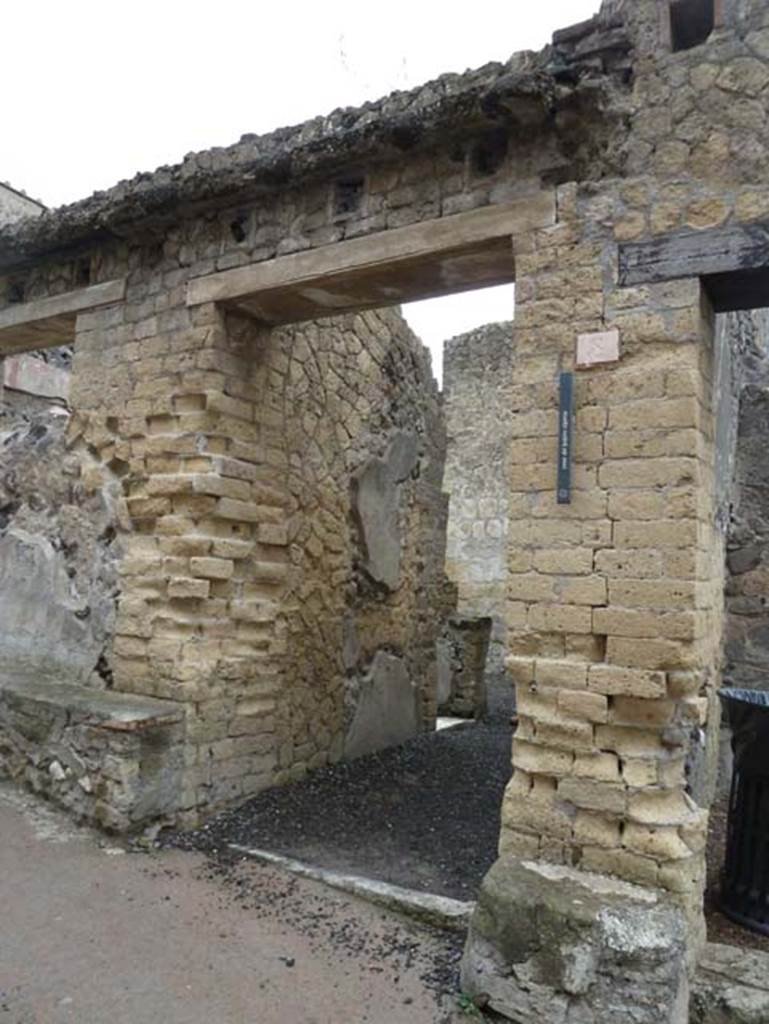 Ins. IV.8, Herculaneum, September 2015. Entrance doorway on east side of Cardo IV Inferiore.