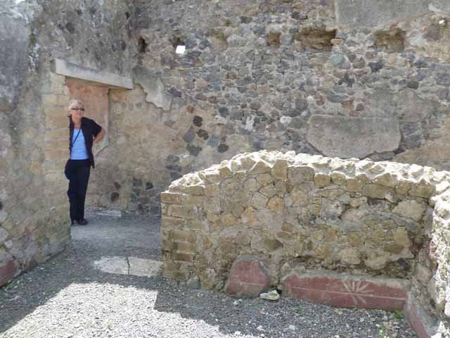 Ins. IV.8, Herculaneum, September 2015. On the left, the doorway into second room on north side of corridor. The other doorway leads to the room at rear and the courtyard area. 
