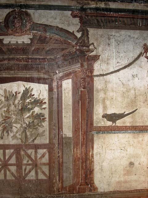 V.5, Herculaneum. May 2003.  Room 1, triclinium, detail of painted decoration from north wall. 
Photo courtesy of Nicolas Monteix.
