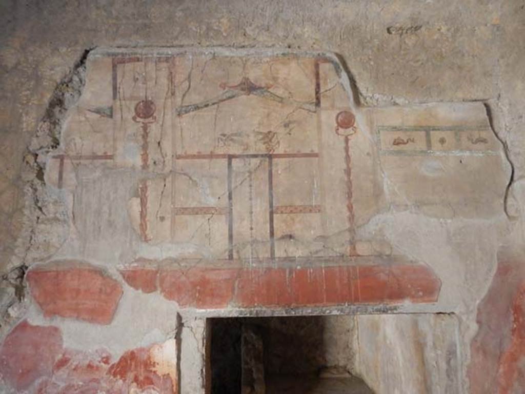 V.8 Herculaneum. May 2018. Room 1, remains of painted decoration on north wall. Photo courtesy of Buzz Ferebee.