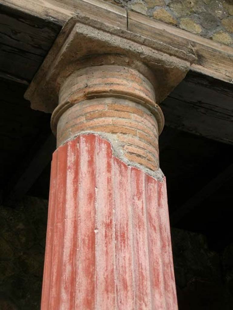 Ins. Or. I.2, Herculaneum. May 2005. Detail of column in atrium.
Photo courtesy of Nicolas Monteix.
