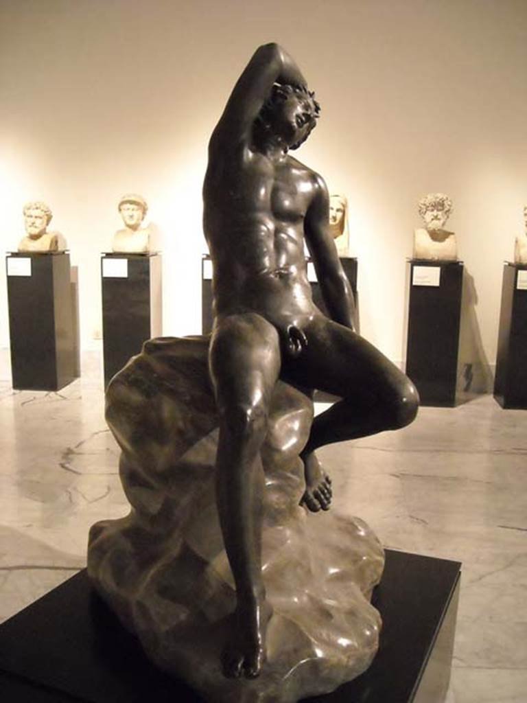 Villa dei Papiri, Herculaneum. Bronze statue of a sleeping Faun. Found in 1756, in the east curve of the pond.
Now in Naples Archaeological Museum. Inventory number 5624.
