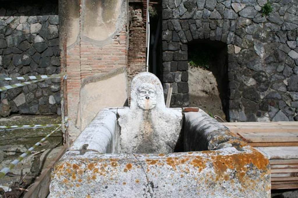 Decumanus Maximus, north side, east end, Herculaneum, March 2008.   
Fountain decorated with head of Hercules. Photo courtesy of Sera Baker.
