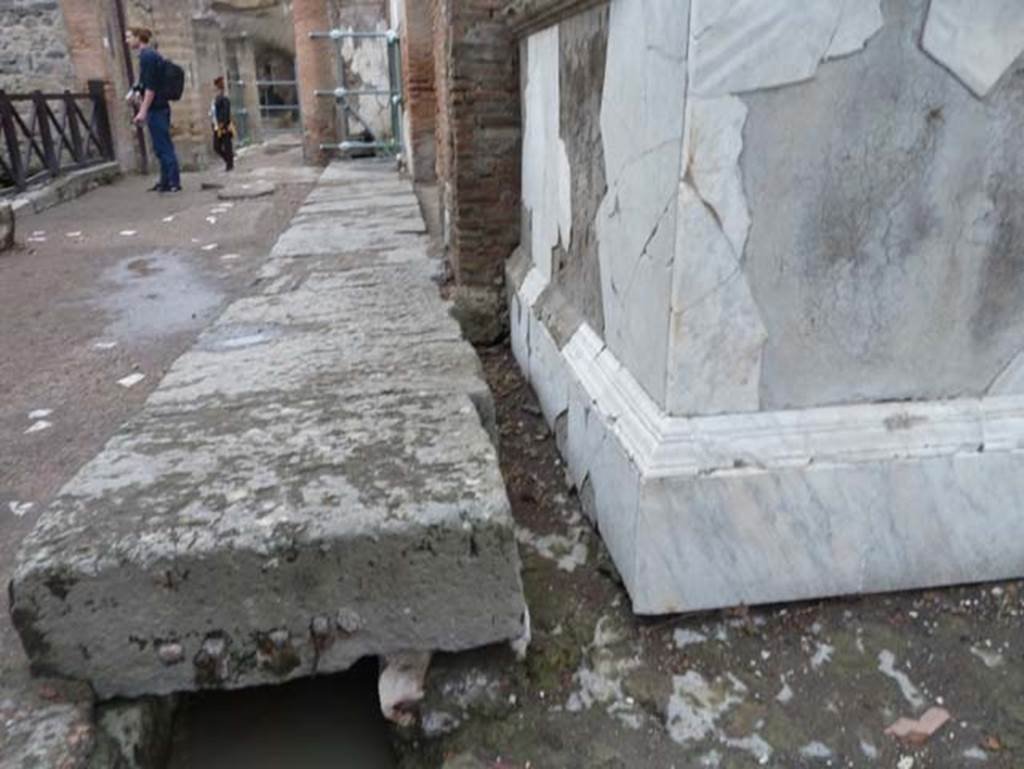 Herculaneum, September 2015. Looking west along front of statue base and along Decumanus Maximus.