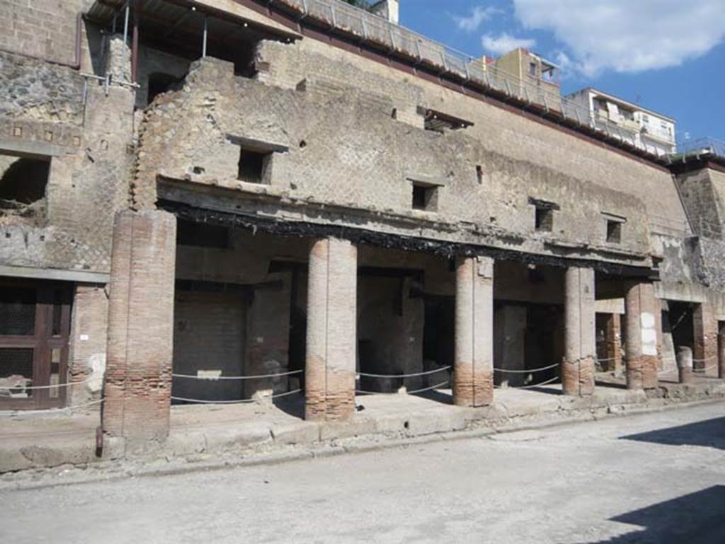 Decumanus Maximus, Herculaneum. August 2013. North side with doorway numbered 1, on left.  Photo courtesy of Buzz Ferebee.

