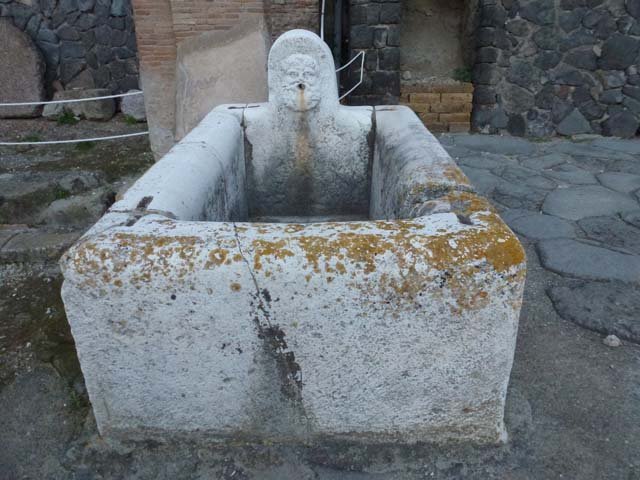Decumanus Maximus, Herculaneum, October 2014.  Fountain decorated with head of Hercules, from fountain on east end of the Decumanus Maximus. Photo courtesy of Michael Binns.
