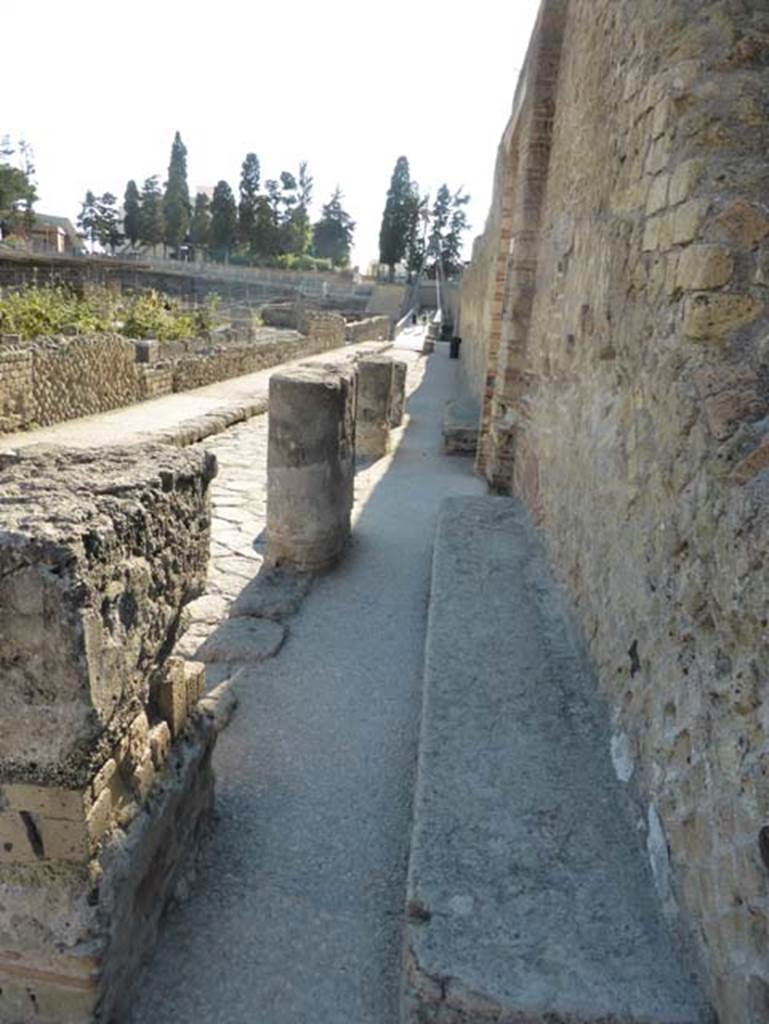 II.2 Herculaneum, September 2015. Looking south on Cardo III Inferiore towards doorway with benches on either side of it. 
