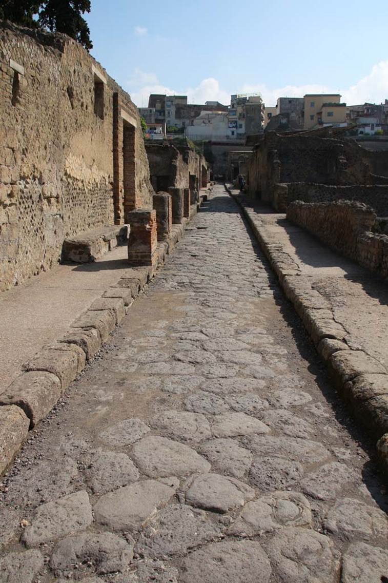 II.2 Herculaneum, April 2014. 
Looking north on Cardo III Inferiore towards doorway with benches on either side of it. 
Photo courtesy of Klaus Heese.

