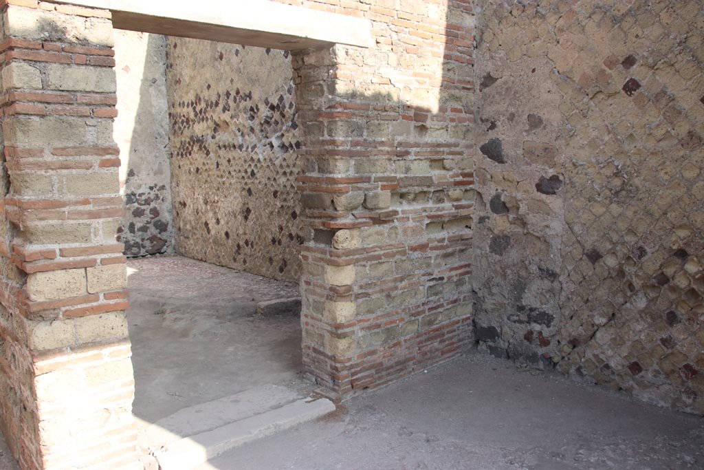 II.2 Herculaneum, October 2023. 
Looking north-west from entrance doorway towards room in north-east corner from peristyle. Photo courtesy of Klaus Heese.
