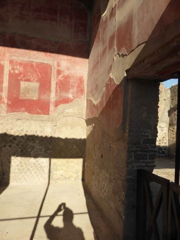 II.2 Herculaneum, September 2015. Looking towards east wall and north-east corner of room on north side of peristyle. On the east wall was a central painting showing Hercules in the garden of Hesperides, but now illegible. 
See Pesando, F. and Guidobaldi, M.P. (2006). Pompei, Oplontis, Ercolano, Stabiae. Editori Laterza, (p.314-5)
See Maiuri, Amedeo, (1977). Herculaneum. 7th English ed, of Guide books to the Museums Galleries and Monuments of Italy, No.53 (p.23-24).
See Guidobaldi, M.P, 2009: Ercolano, guida agli scavi. Naples, Electa Napoli, (p.54-55).
