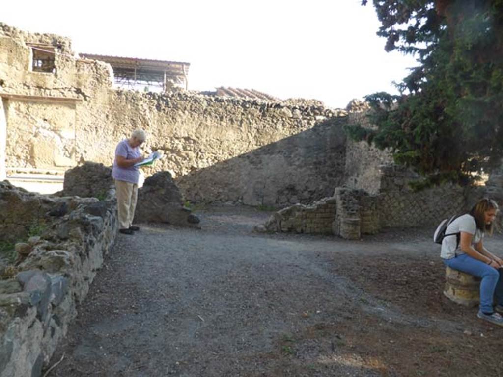 II.3 Herculaneum, September 2015. Looking east along north portico, towards doorway to room in north-east corner.