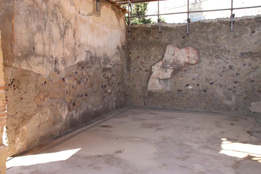 III.3 Herculaneum. October 2022. 
Looking towards south and west walls of triclinium, from second doorway into a small corridor. Photo courtesy of Klaus Heese.
