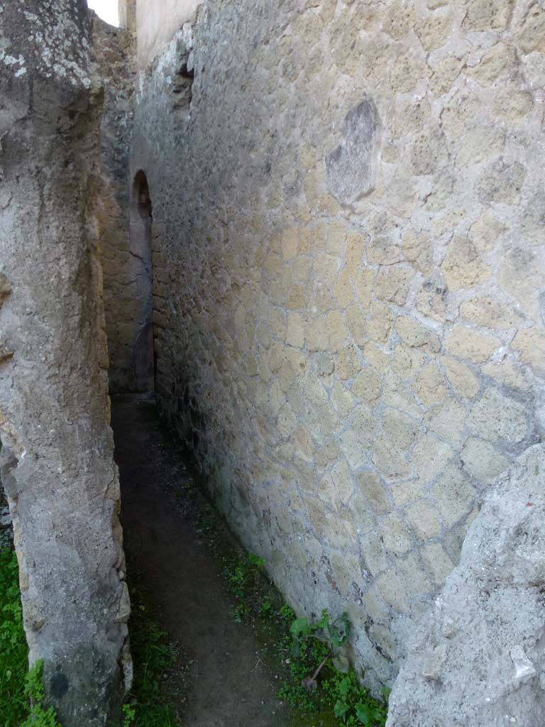 III.19/18/1, Herculaneum. October 2012. 
Corridor leading to north side of Room 3, apodyterium, or waiting room. Photo courtesy of Michael Binns.

