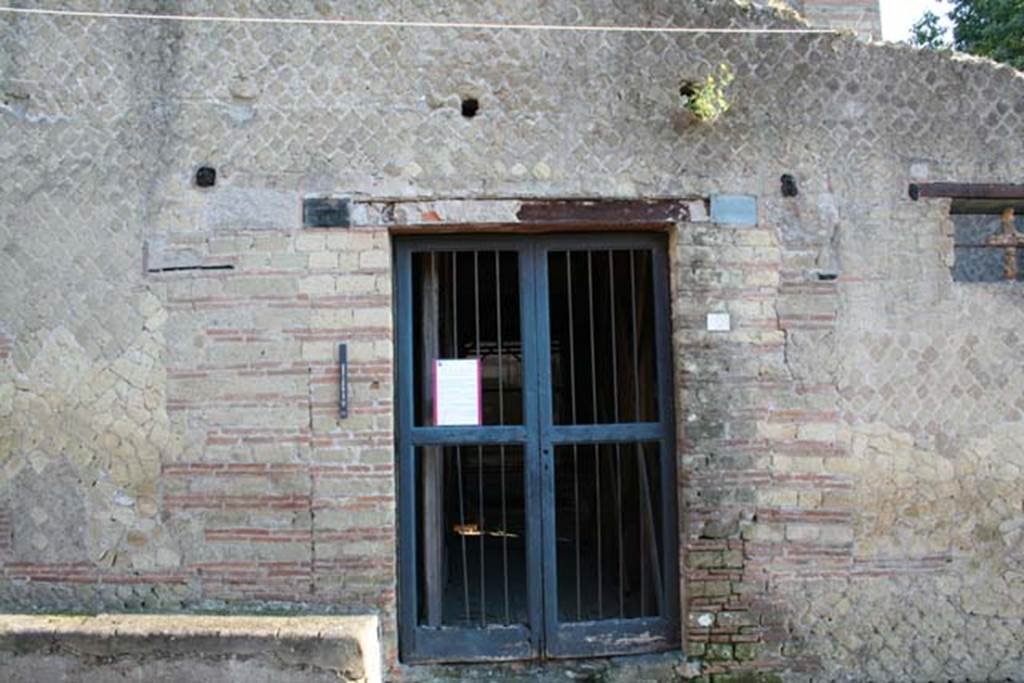 IV.2 Herculaneum, October 2014. Looking east to open entrance doorway, but closed to visitors!  Photo courtesy of Michael Binns.
