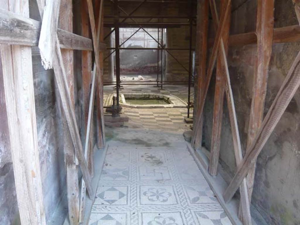 IV.2, Herculaneum, August 2013. Looking east along entrance corridor towards atrium, from entrance doorway. Photo courtesy of Buzz Ferebee.
