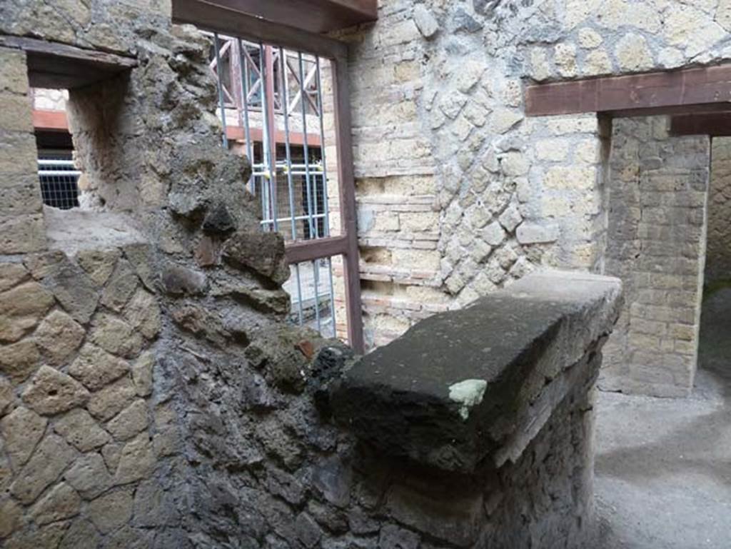 IV.4 Herculaneum. September 2015. 
Room 2, looking north-west. The doorway, left of centre, is the doorway leading to the steps to the upper floor at IV.3.
