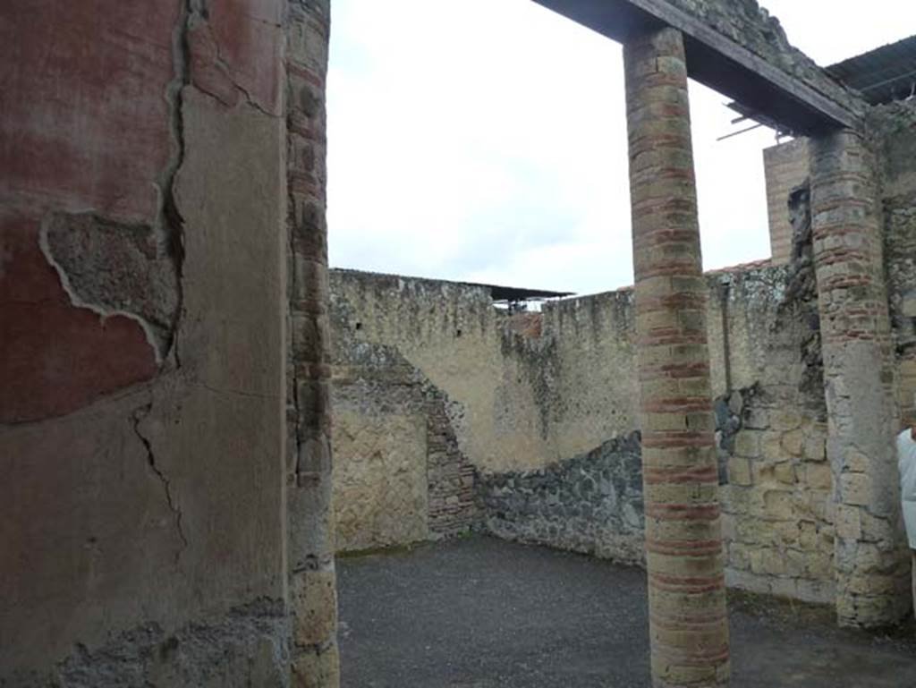 IV.4 Herculaneum. September 2015. Courtyard 3, east wall, looking south-east across open courtyard 6. 