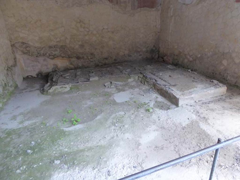 IV.4 Herculaneum. October 2014. Room 19, looking west towards the remains of the two-sided carbonised wooden couch.  Photo courtesy of Michael Binns.
