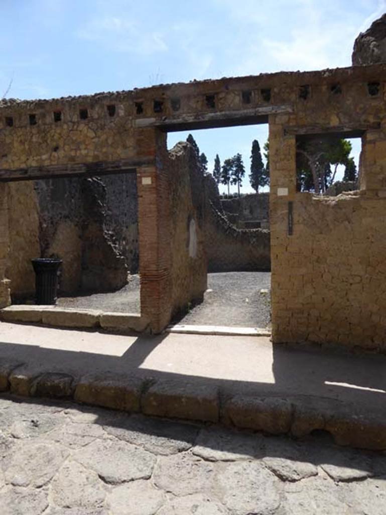 IV.6, on right, Herculaneum, September 2015. Entrance doorway on east side of Cardo IV Inferiore.  Photo courtesy of Michael Binns.
