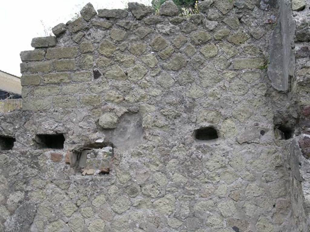 IV.18 Herculaneum, May 2005. Room 3, detail of north wall and holes for support beams of an upper floor.
Photo courtesy of Nicolas Monteix.
