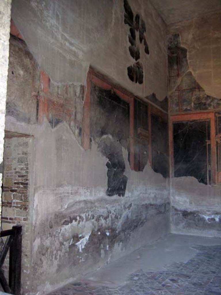 IV.21 Herculaneum, June 2011. Triclinium 5, looking north along west wall.
Photo courtesy of Sera Baker.
