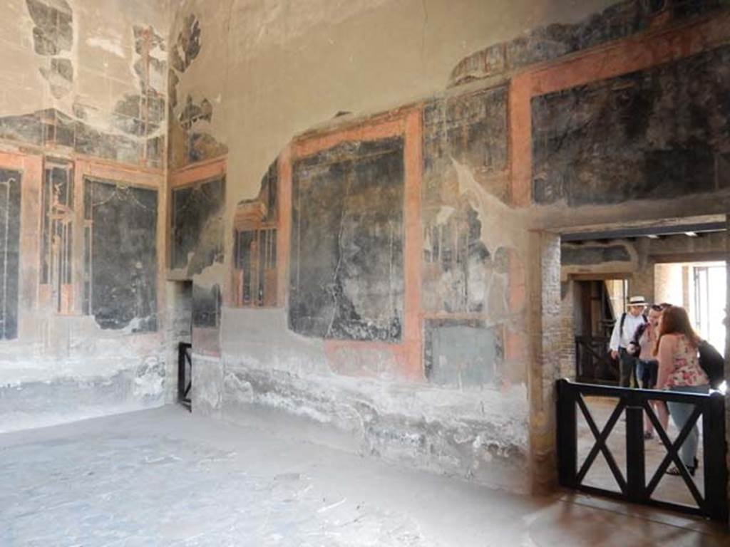 IV.21, Herculaneum. May 2018. Triclinium 5, looking towards east wall and north-east corner. 
Photo courtesy of Buzz Ferebee. 
