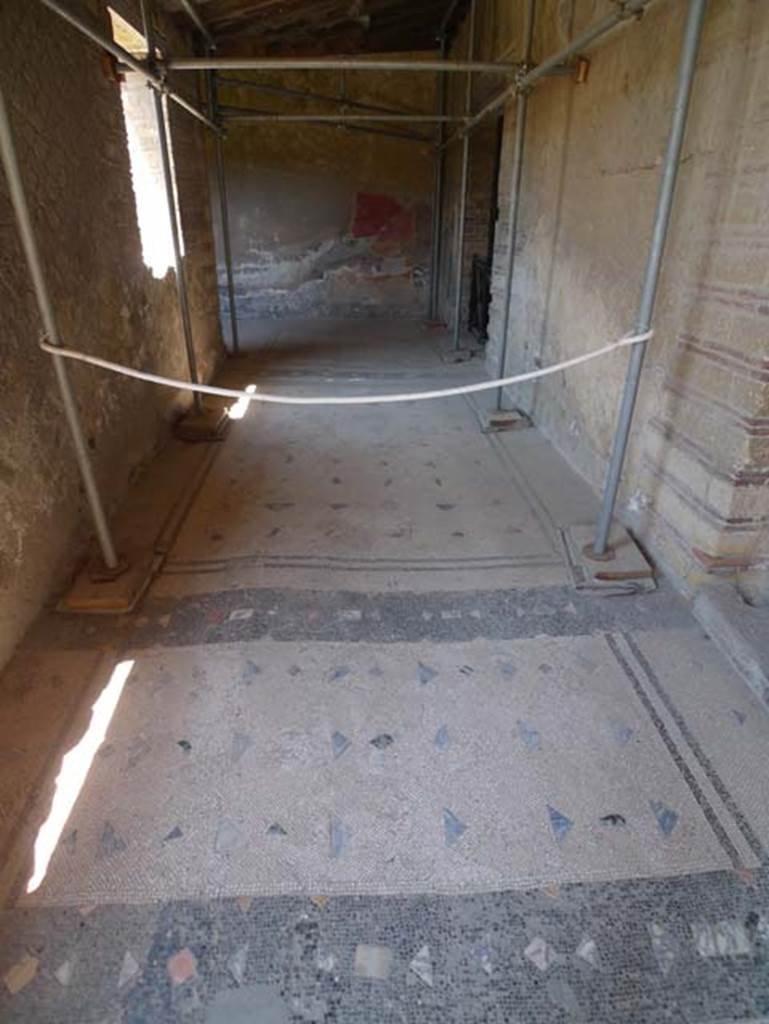 IV.21, Herculaneum, June 2017. Cryptoporticus 28, looking west along portico 28, from near doorway from room 6. The doorway to room 7 can be seen, centre right.  Photo courtesy of Michael Binns.
