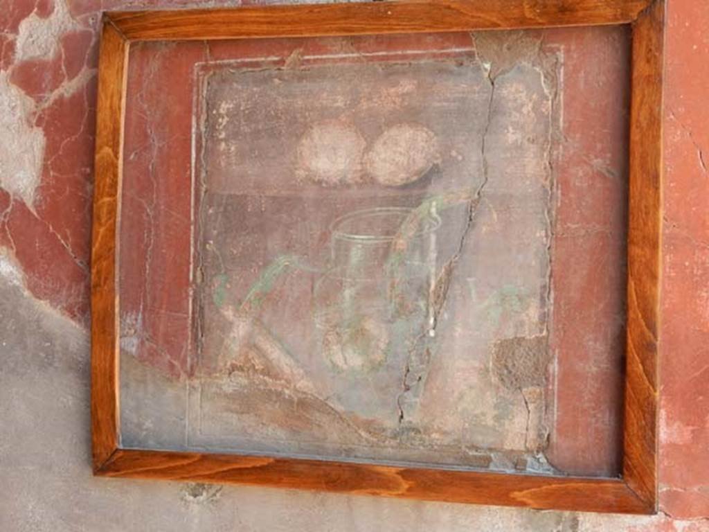 IV.21, Herculaneum. May 2018. Cryptoporticus 30, south wall, still life painting. Photo courtesy of Buzz Ferebee. 