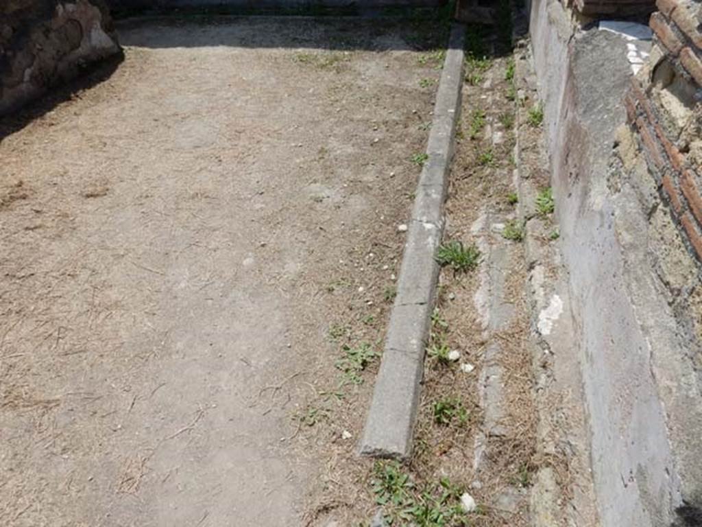 IV.21, Herculaneum. May 2018. Area 34, looking south from south side of garden area.
On the right is the exterior wall of Oecus 15, on its east side.  Photo courtesy of Buzz Ferebee. 
