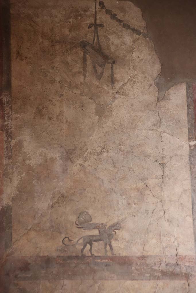 IV.21, Herculaneum. October 2020. 
Room 24, upper west wall in atrium, detail from south end above doorway to Room 5. Photo courtesy of Klaus Heese.  
