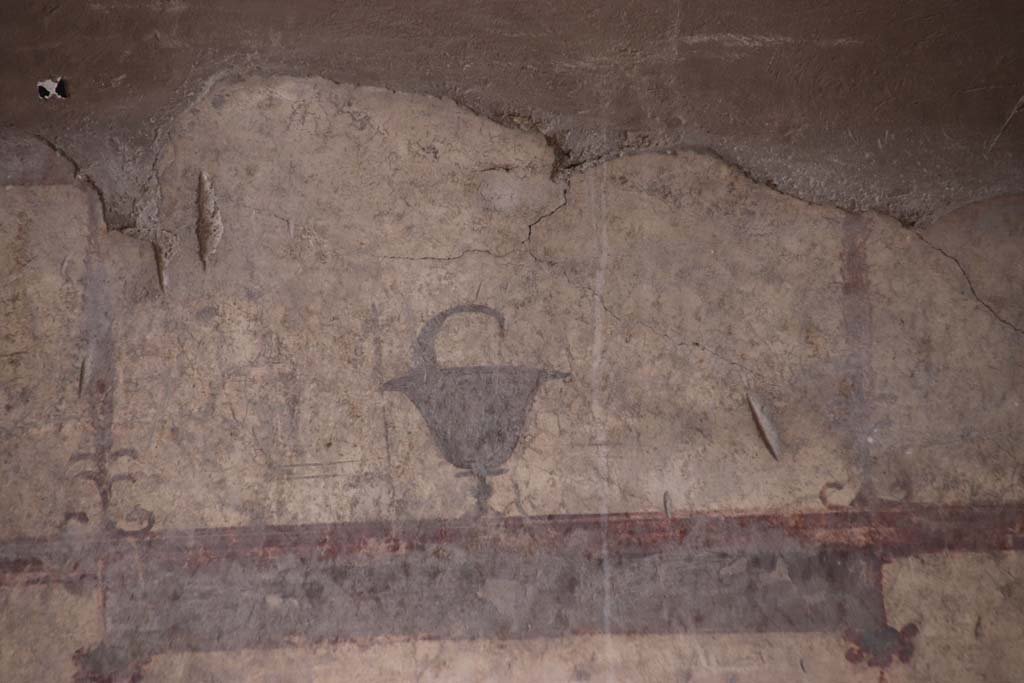 IV.21, Herculaneum. October 2020. 
Room 24, painted decoration from north end of upper west wall in atrium. Photo courtesy of Klaus Heese.  
