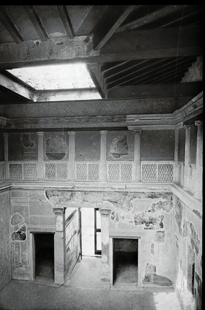 V.1 Herculaneum, The Samnite House. Photo by Theodor Benzinger.
Looking towards west end of atrium, with restored compluvium in roof.
Used with the permission of the Institute of Archaeology, University of Oxford. 
File name INSTARCHbx21im003 Resource ID 37885.
See photo on University of Oxford HEIR database
