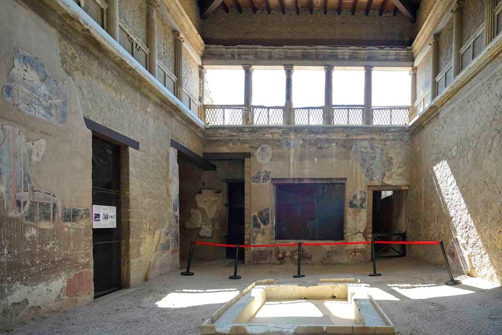 V.1 Herculaneum. August 2021. Looking east across impluvium in atrium. Photo courtesy of Robert Hanson.

