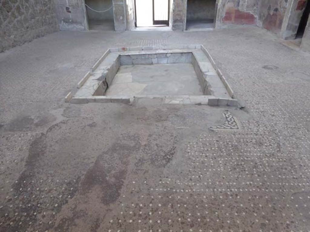 V.1, Herculaneum, October 2014. Impluvium in atrium, looking west. Photo courtesy of Michael Binns.