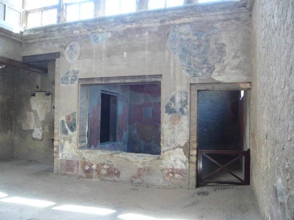 V.1 Herculaneum. August 2013. Looking towards room 6, the tablinum in the south-east corner of the atrium. Photo courtesy of Buzz Ferebee.