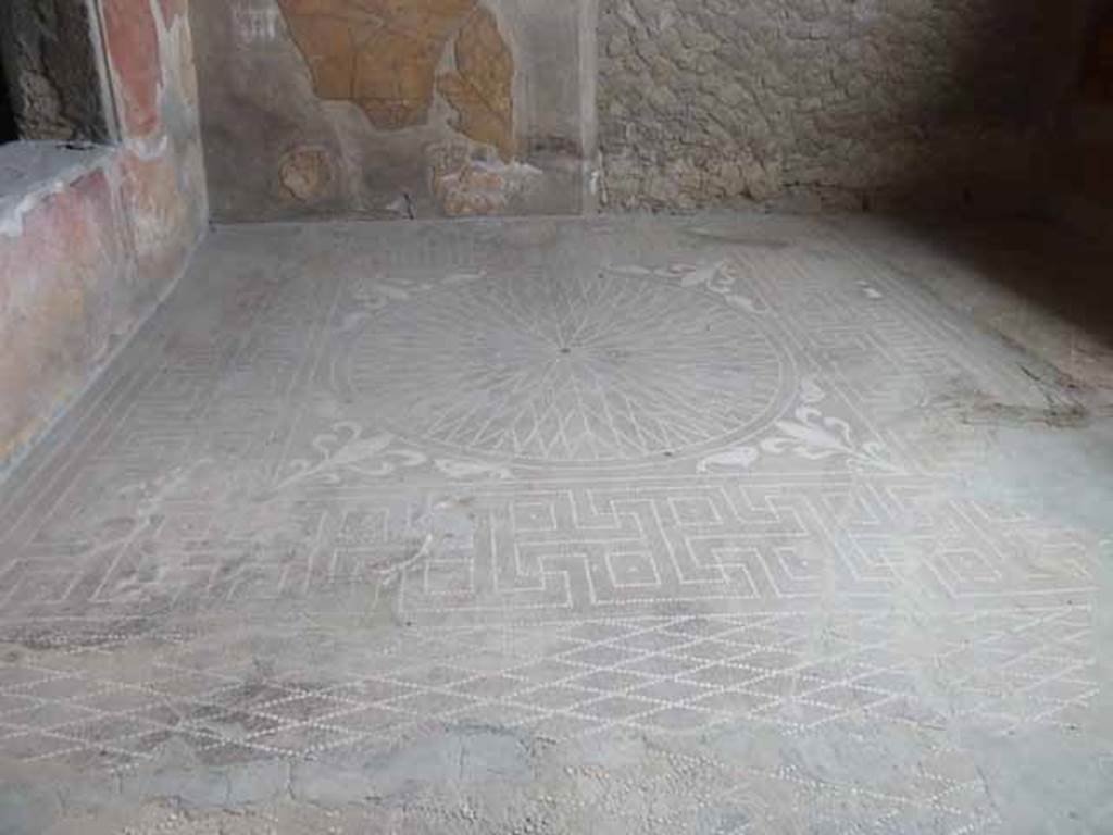 V.1 Herculaneum. May 2010. Room 6, looking across the flooring to the north-east corner of tablinum.