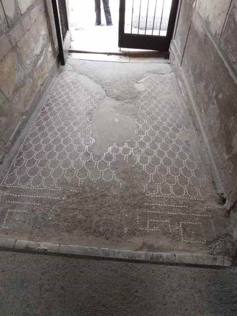 V.1 Herculaneum. May 2010. Looking west from atrium along floor of entrance corridor towards exit. 