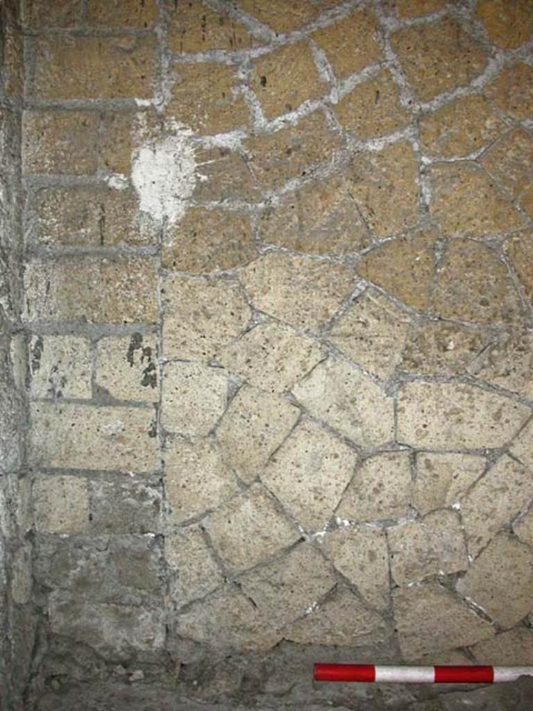 V.6, Herculaneum. September 2003. Detail of blocked doorway in east wall of shop-room. 
Photo courtesy of Nicolas Monteix.

