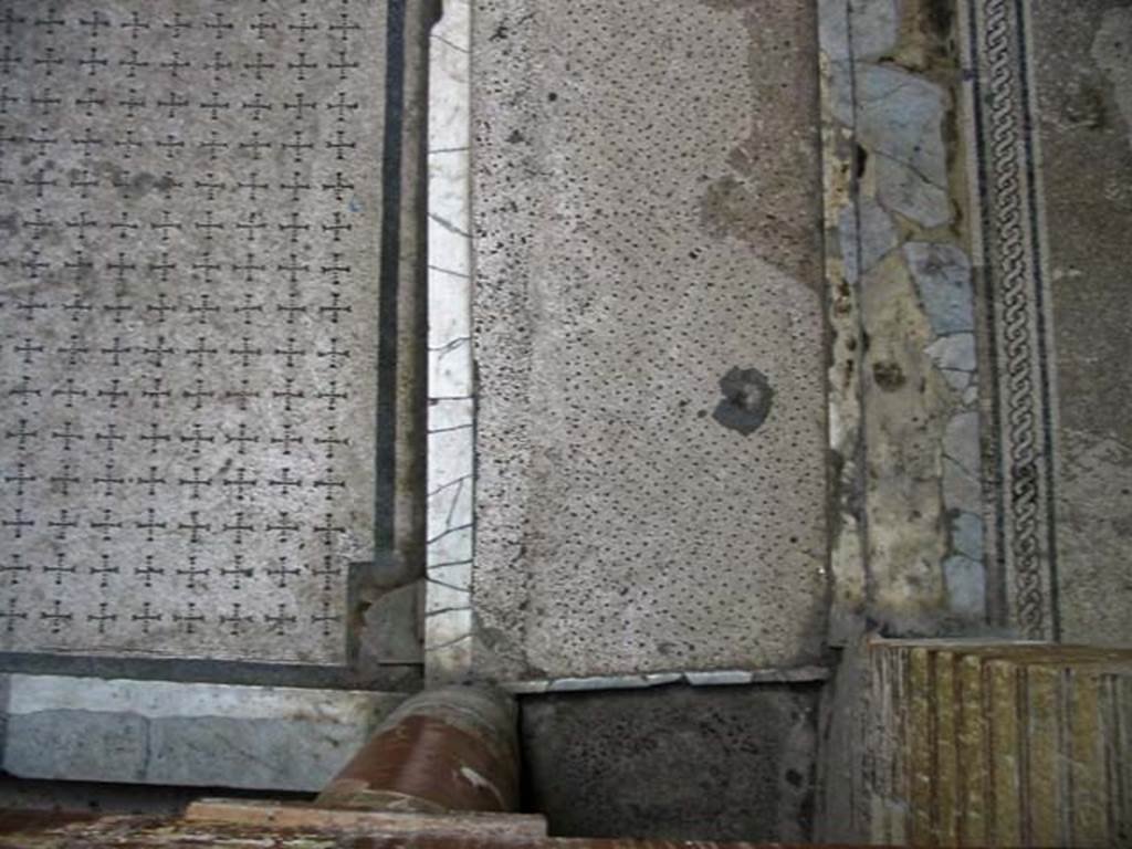 V.8 Herculaneum. May 2003.  Area 4, flooring in south-west corner, with “cover” over drainage hole. Photo courtesy of Nicolas Monteix.

