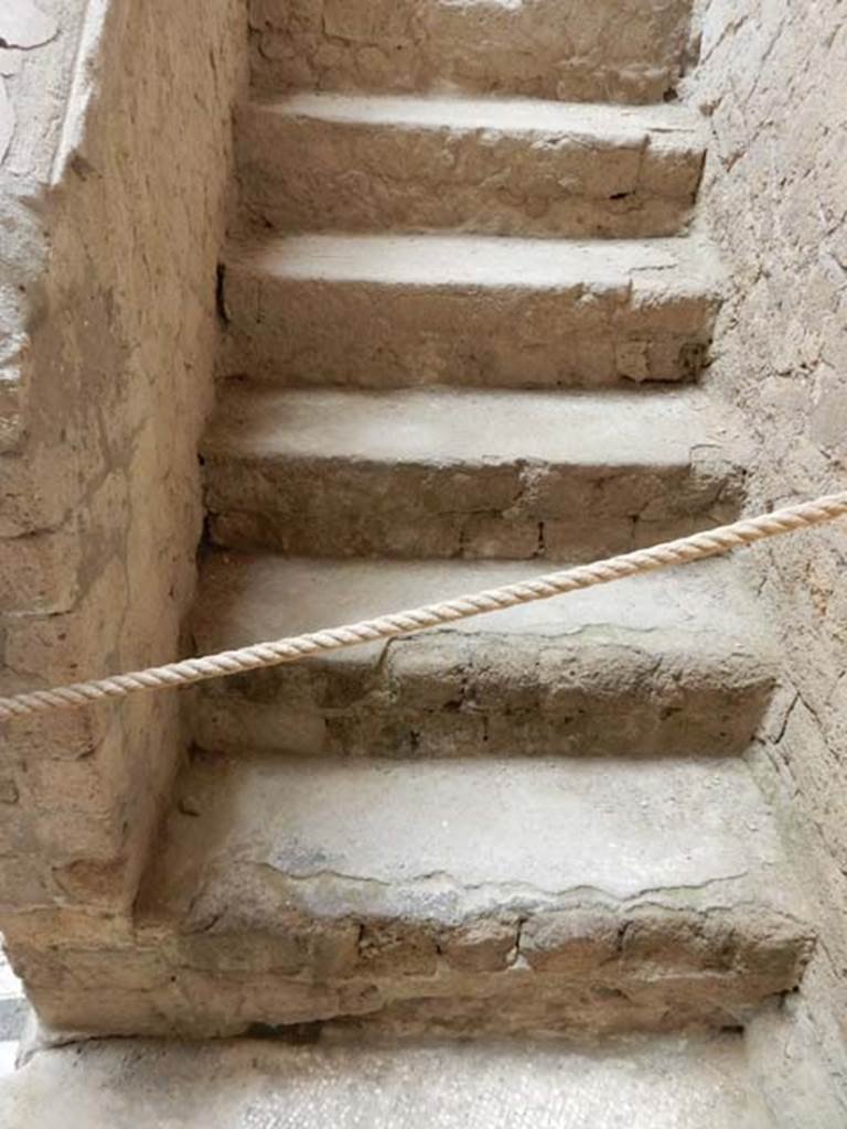 V.8 Herculaneum. May 2018. Area 4, masonry stairs on east side of “beautiful” courtyard. 
Photo courtesy of Buzz Ferebee.
