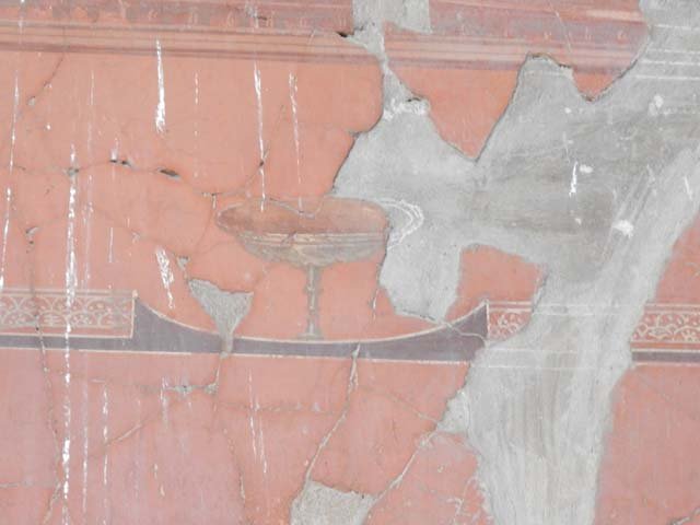 V.8 Herculaneum. May 2018. Room 7, detail from north wall on east side of doorway. Photo courtesy of Buzz Ferebee.
