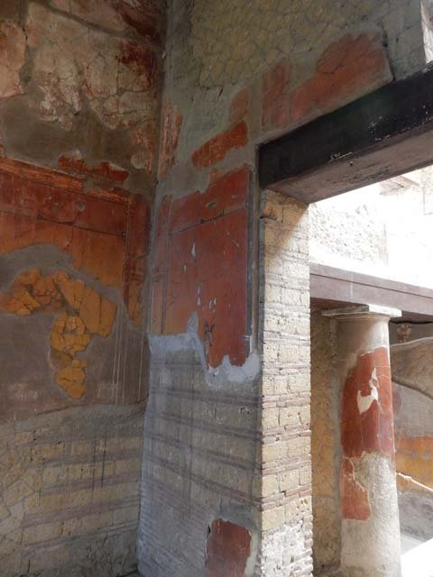 V.8 Herculaneum, May 2018. 
Room 7, painted decoration from west side of doorway in north wall of the large salon above the painted cupid.
Photo courtesy of Buzz Ferebee.

