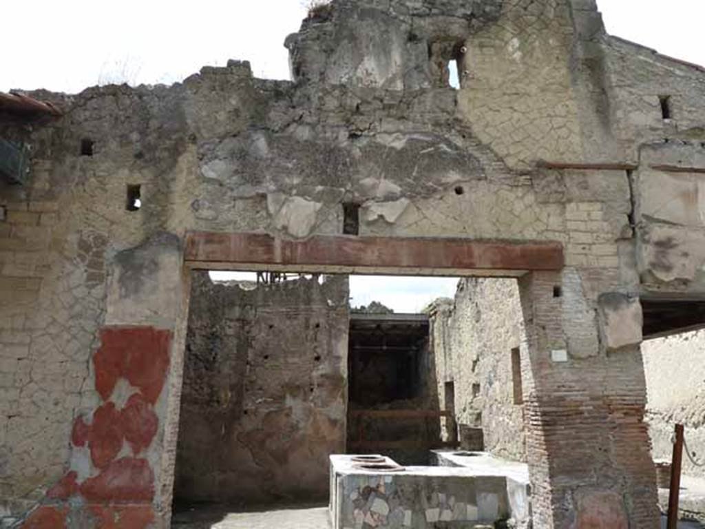 V. 10. Herculaneum. May 2010. Looking south-west towards shop.