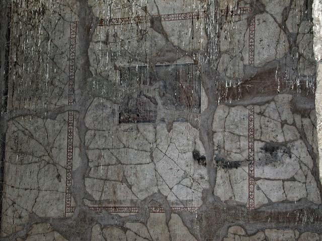V.14, Herculaneum. May 2006. Upper floor apartment with lararium on rear wall of room 9 between two cubicula, E and F.