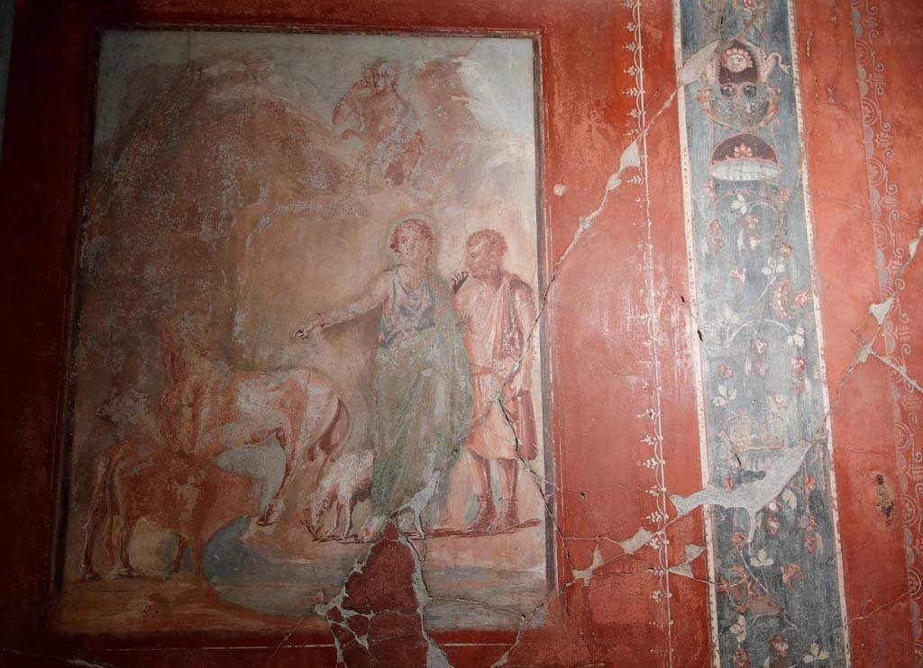 V.15 Herculaneum. October 2019. West wall of tablinum, with central painting of Daedalus and Pasiphae. 
Photograph © Parco Archeologico di Pompei.