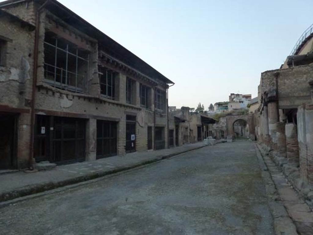 Decumanus Maximus, Herculaneum, October 2012. Looking west between Ins. V, on left, and north side of Decumanus Maximus, on right. The large House of the Bicentenary can be seen on the left, and nearly opposite under the portico is another large house, which is still unexcavated. Photo courtesy of Michael Binns.
