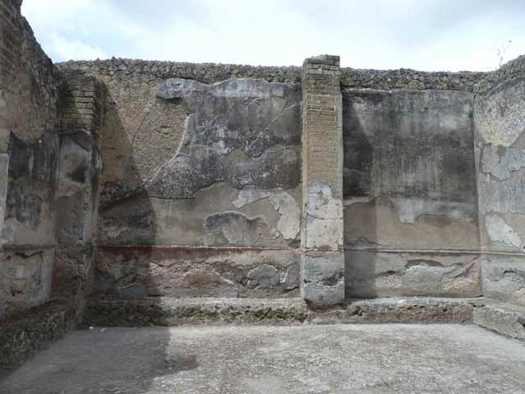 VI.8, Herculaneum. May 2010. West wall of the vestibule with masonry seats.