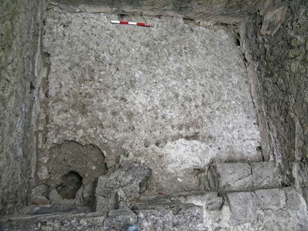 VI.12, Herculaneum. September 2004. Looking down on floor in in rear room. Photo courtesy of Nicolas Monteix.

